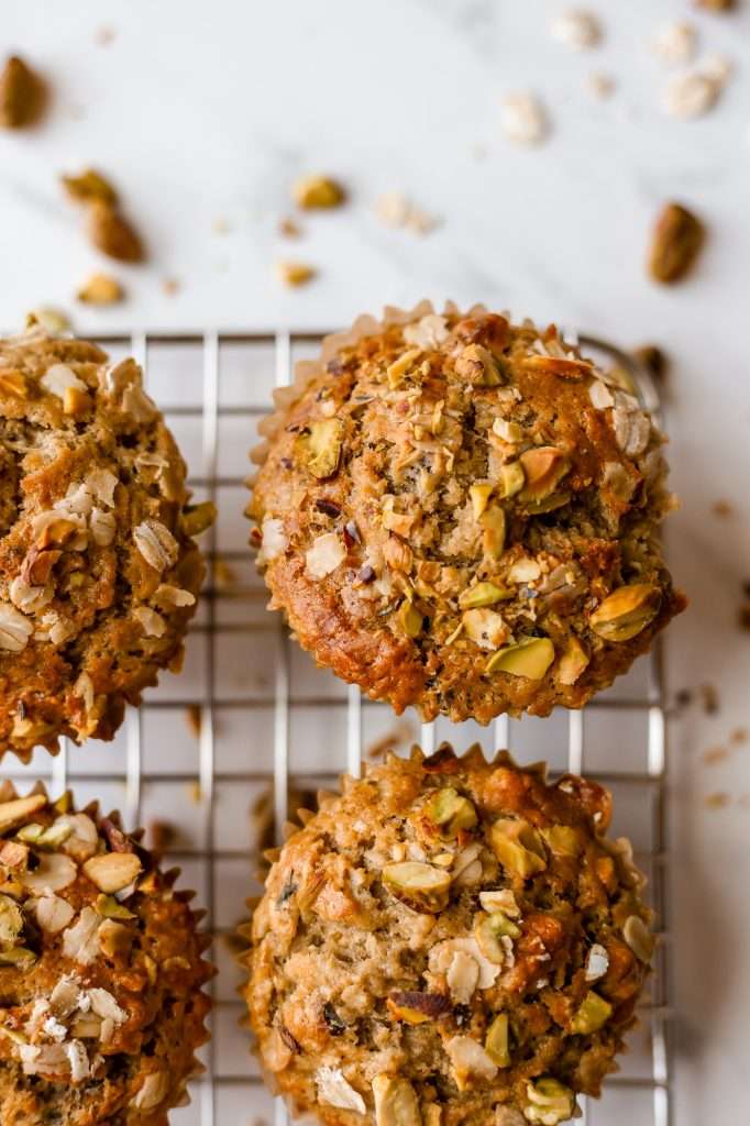 sourdough discard banana nut muffins, fully baked and cooling on a rack