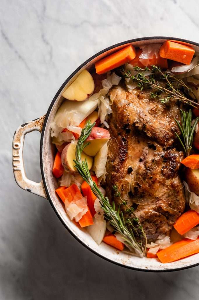 Slow Cooked Pork Roast with Sauerkraut Potatoes and Carrots