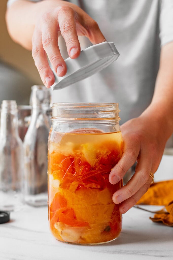Fermented pineapple habanero mixture in the jar after several days.