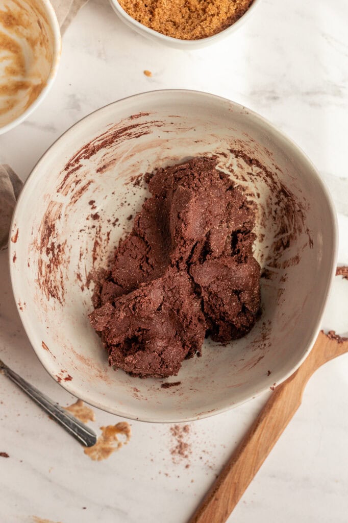 Cookie dough like consistency for sourdough crackers The wet and dry ingredients are mixed together to form a soft, pliable dough that is similar to cookie dough.