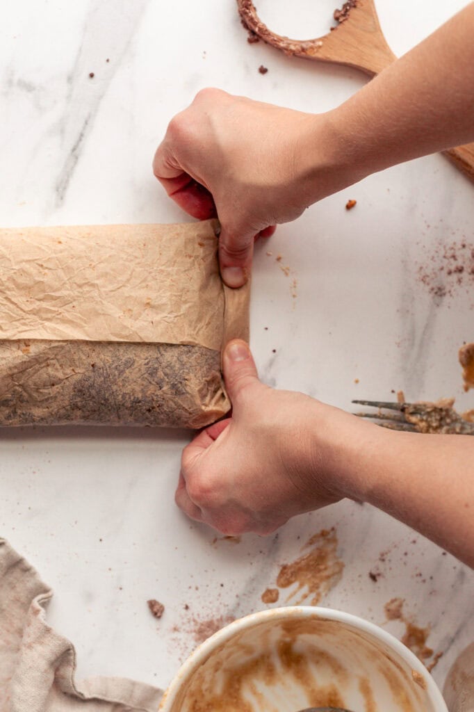 Chocolate Sourdough Wrapped in Parchment Paper After shaping into a slab shape, the dough is wrapped in parchment paper.